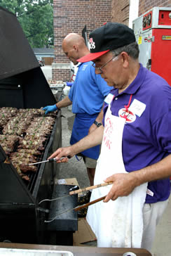 Cooks at the grill