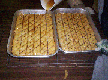 Pouring syrup on baklava