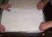 Preparing filo dough for baklava